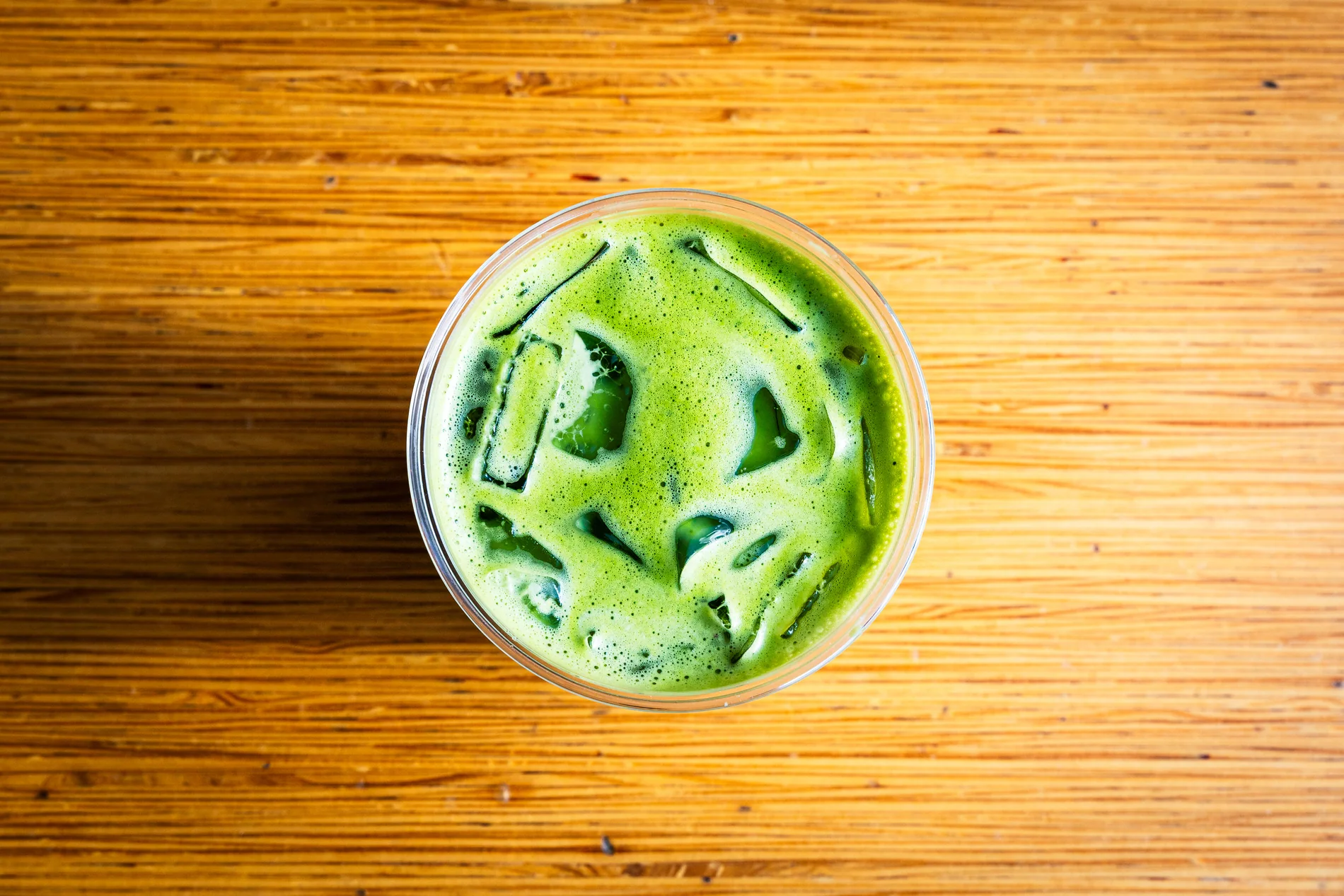 Green signature drink over ice